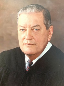 The Honorable Conrad 