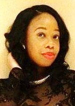 Zikia M. Bacon-Farmer