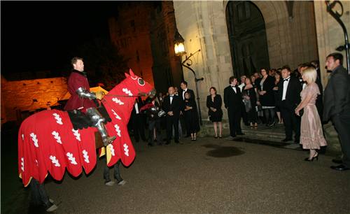 The Red Knight greets his guests