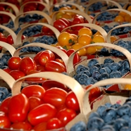 Berries and tomatoes at a farmer's market