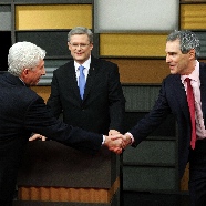 Ignatieff and Duceppe shake hands in front of Harper