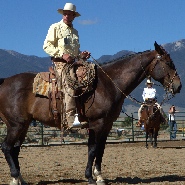 Buck Brannaman sittin on his horse.