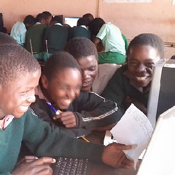 Children learning through technology.