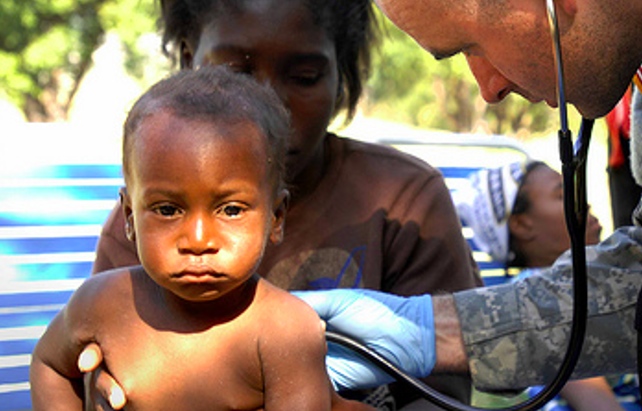 Army helps child in Haiti