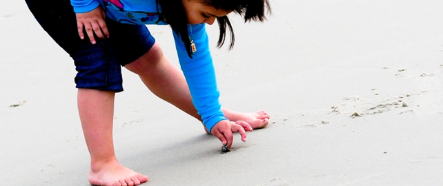 Child playing in sand