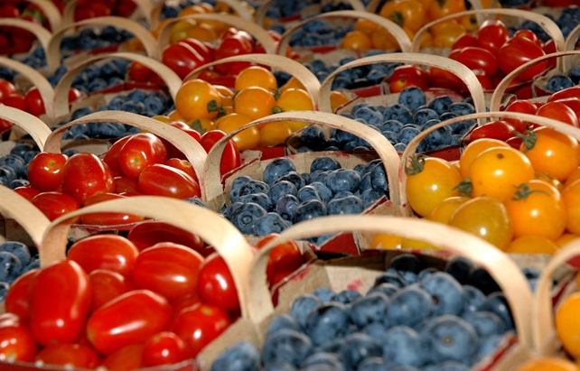 Berries and tomatoes at a farmer's market