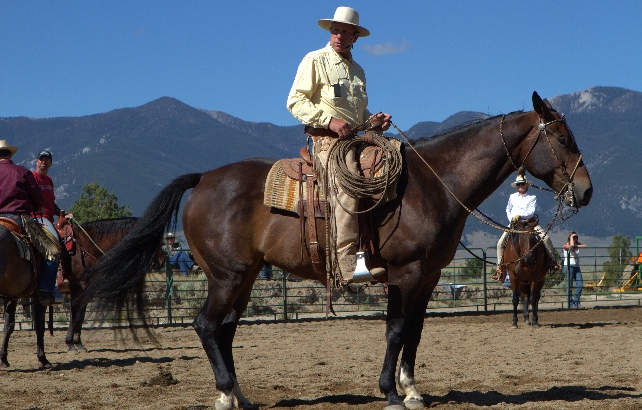 Buck Brannaman sittin on his horse.