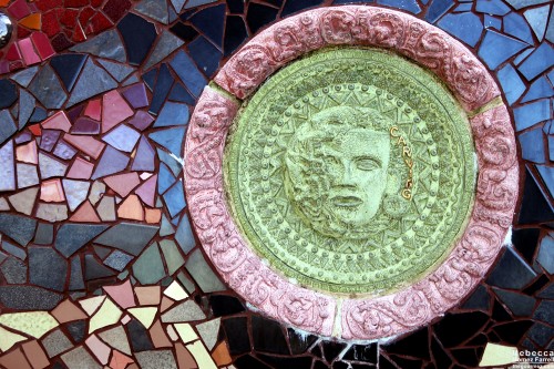  One of many plaques celebrating different types of crafts embedded within the snake’s scales.