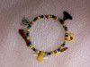 Thumb_jewelry_neckbraceear_hpcharmbracelet_june2010_cal_lizzyrc