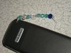 Thumb_othercrafts_muggledevices_ravenclawphonecharm_octnov2010_cal_irislily