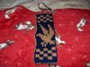 Thumb_knitting_bookmarksbuttonsnmagnets_ravenbookmark_goonie56