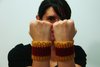 Thumb_knitting_mugglewear_gryffwristbands_angiejude