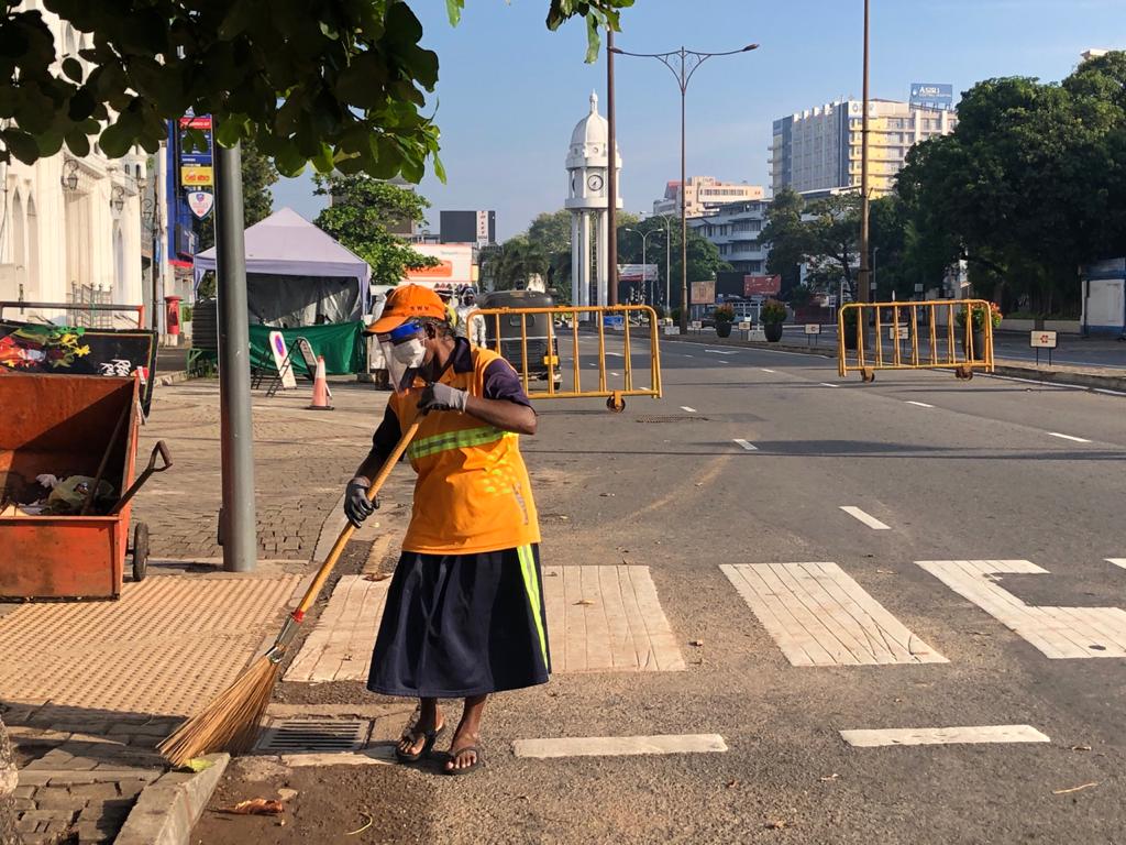 Safety of street cleaners amidst the pandemic Clad in orange, yet