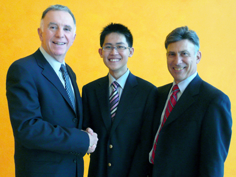 Danny Lee Dian Woon, center, was awarded the first Eli W. Cohen Scholarship by Richard Tomasetti (left) and Joel Weinstein (right).
