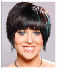 Model with black hair and blue highlights