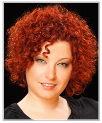 Woman with short red curls