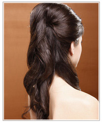 Model with dark half up half down hair