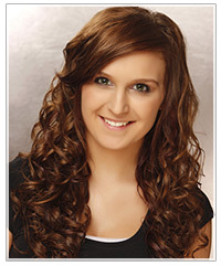 Model with brunette hair and curls