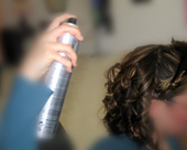 Apply hairspray