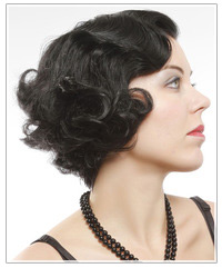 Model with short black curly hair