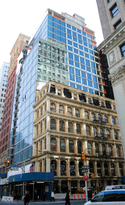 The glassy Reade57 (behind shorter building) plans to launch sales next month.