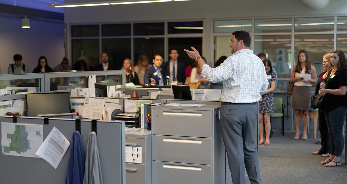 hero-square-person-speaking-to-office Person speaking to office