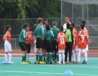 Pre-game_talk_with_coach_gus_medium