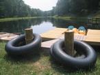 SECLUDED 2 BR 1 BA COTTAGES. STOCKED LAKE W/PEDALBOAT, PRIVATE HOT TUB, & GAS FIREPLACE.