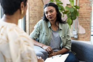 A counselor meets with a client.