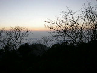 Sunset over the clouds