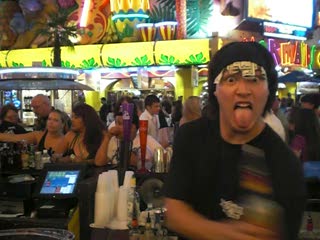 Creatively-haberdashed bartender does the boogaloo for Nikki