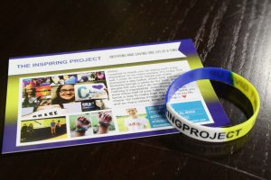 Chase's bracelet and "Inspiring Project" flyer