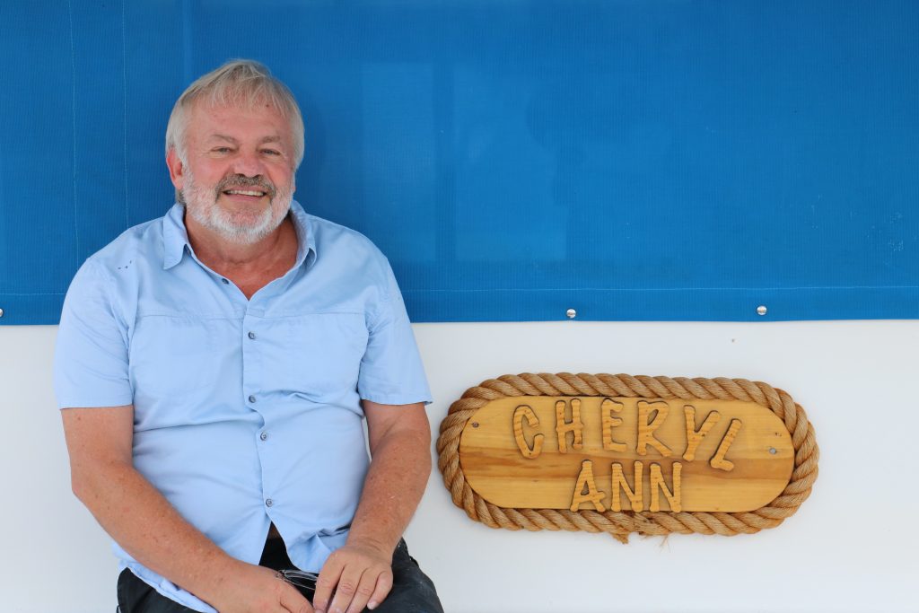 Gary Stephen Cole sits on his boat, Cheryl Ann, in the Port of Salisbury Marina. (Photo: Lauren Holloway)