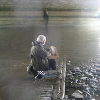 Tide coming in on John Shave under Putney Bridge