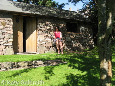 Katy outside the Bothy in the Sun