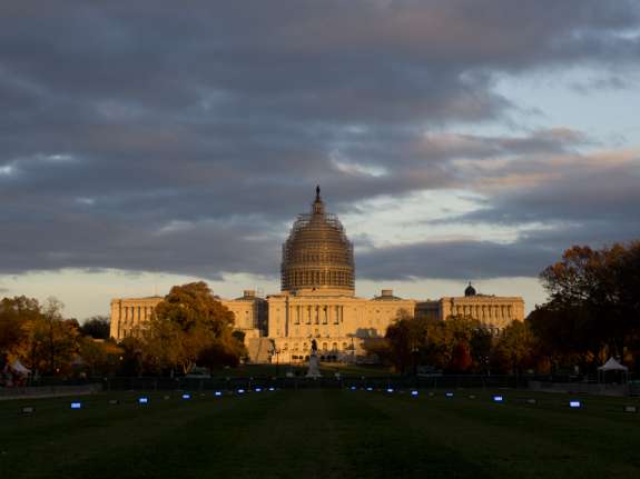The sun sets on the U.S. Capitol Building on the National Mall in Washington. Photo: Wikimedia Commons.