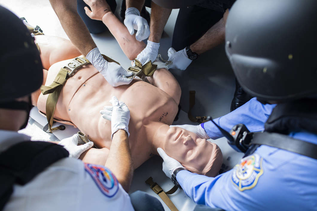 Orange County Swift Assisted Victim Extraction (S.A.V.E) Team performs an extraction on a dummy at Fire Station 67 on September 12, 2018 in Orlando, Florida. The Orlando Fire Department had received special equipment and training to respond to an active shooter situation, but when Pulse happened, none of it was used. (Cassi Alexandra for ProPublica)