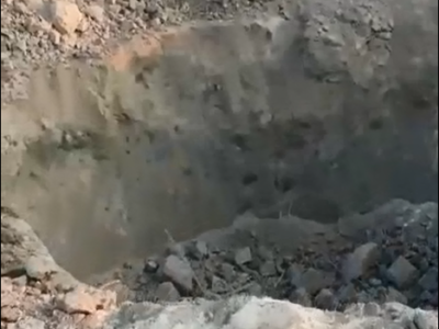 A video provided by Syria's White Helmets volunteers shows a crater where the attack took place.