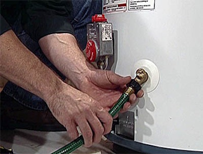water_heater_maintenance-remodelinghomeimprovement draining water heater