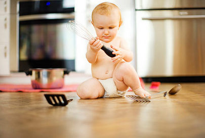 bornangels.com-Baby-in-Child-Proofed-Kitchen.jpg Childproofing Tipes