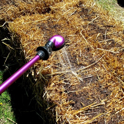 watering-container Make a Straw Bale Planter - Watering Container