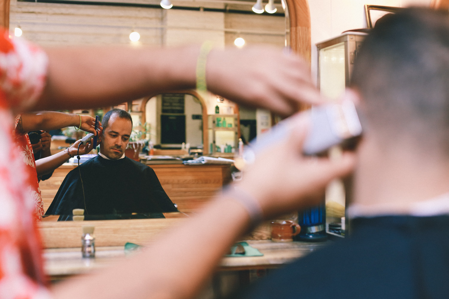 Jay Smooth gets his hair cut at Fellow Barber