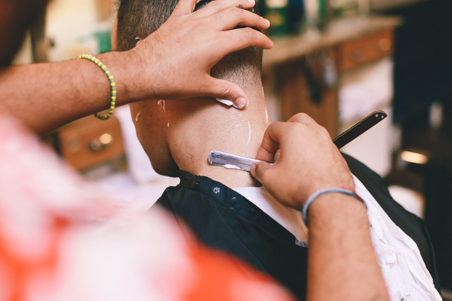 Jay Smooth gets his hair cut at Fellow Barber