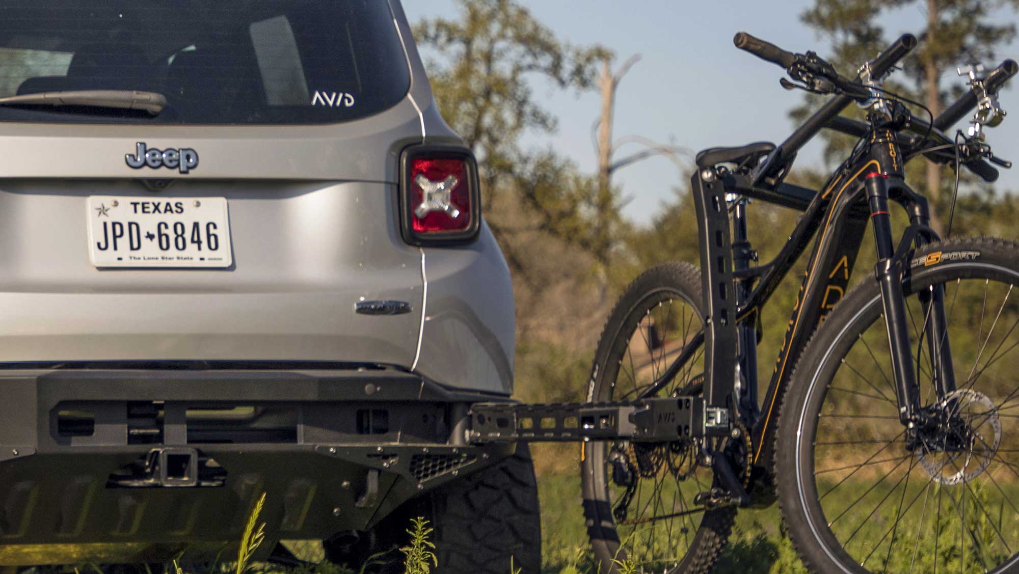 Avid Essentials' fully retractable bike rack hides in the rear bumper Bikerumor