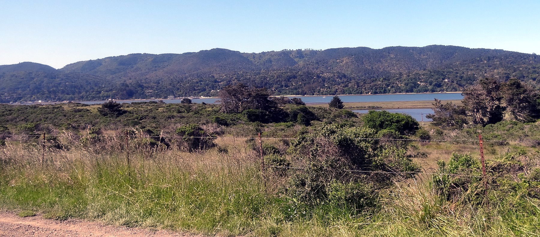 On the far side is the granite of Point Reyes, a more popular place to put vacation houses than the muddy continental side.