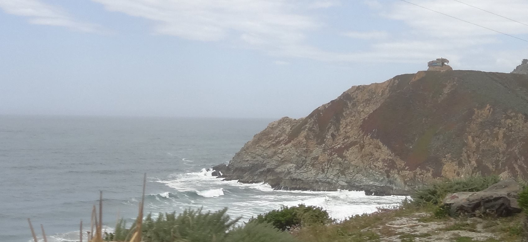 The land is old and broken and falls into the sea. An old concrete gun emplacement gives testament to old wars that fall from memory. The sea claims all eventually.