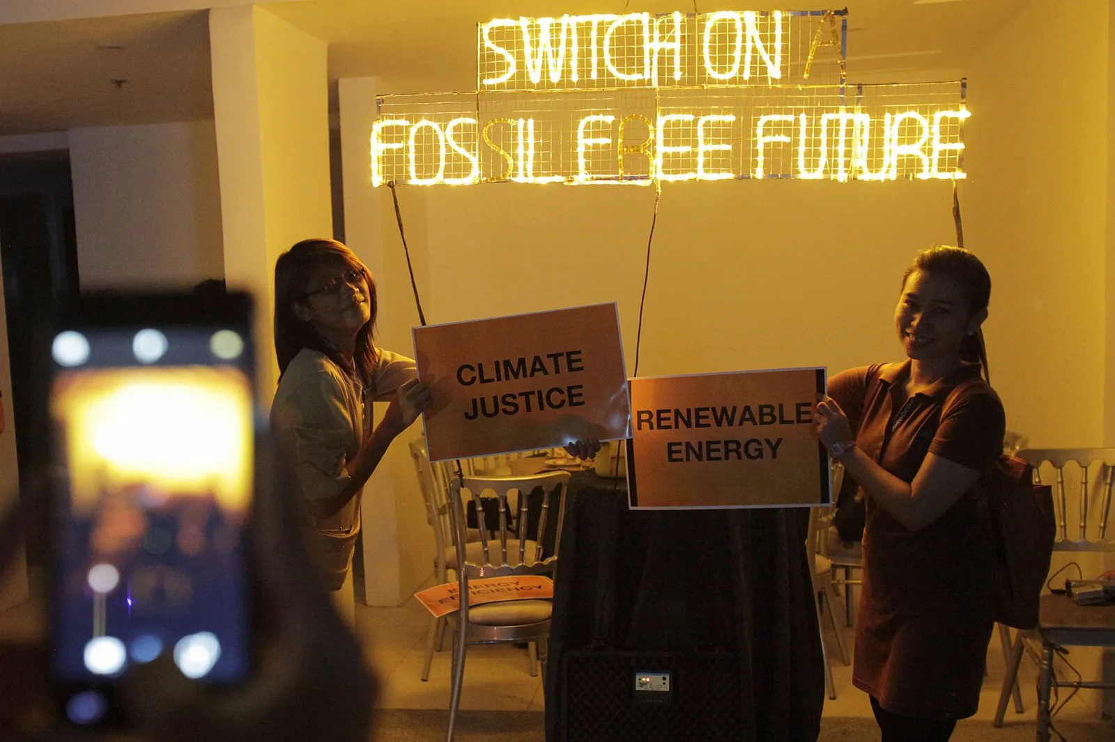 Participants of the Earth Hour activity in Manila, Philippines, strike a pose for climate action. Photo by: LJ Pasion 
