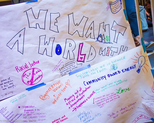 hand-written notes about an ideal world to aspire for