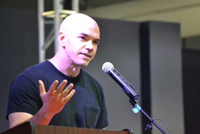 Activist Tim DeChristoper speaking at event