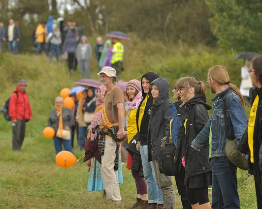 Thousands of anti-coal protestors form 8km 'human chain' against lignite mining. Photographer: Bogusz Bilewski
